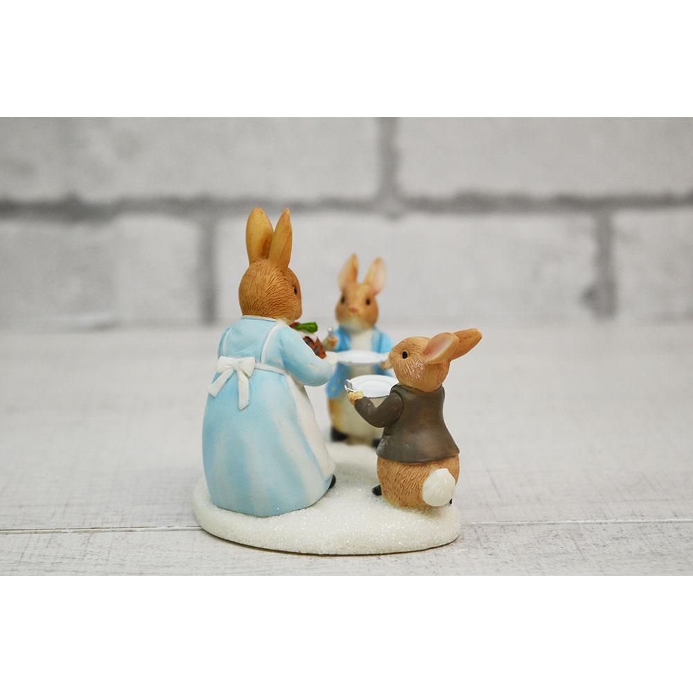 Mrs. Rabbit with a Christmas Pudding Figurine